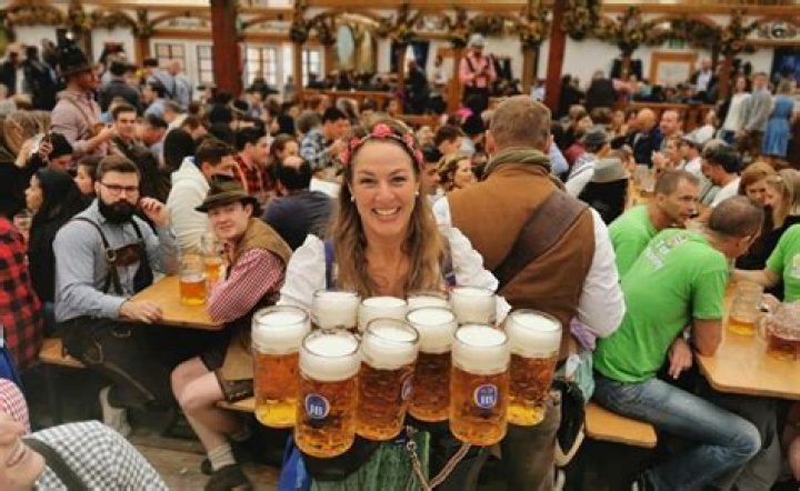 Oktoberfest service staff can carry up to this many beer mugs as once Word Hike – Answers